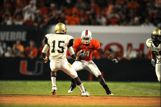 University of Miami Hurricanes wide receiver Aldarius Johnson #4 catches a pass against Charleston Southern University in the Canes inaugural game at...