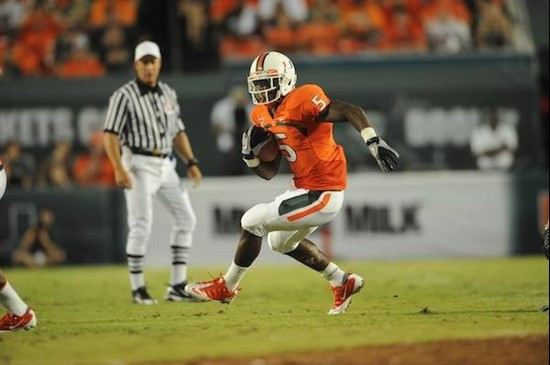 University of Miami Hurricanes running back Mike James #5 carries the ball against the FAMU Rattlers at Sun Life Stadium on September 2, 2010.  Photo...