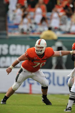 University of Miami Hurricanes guard J.J. Trump #70 plays in a game against the University of Central Florida Knights at Dolphin Stadium on October...