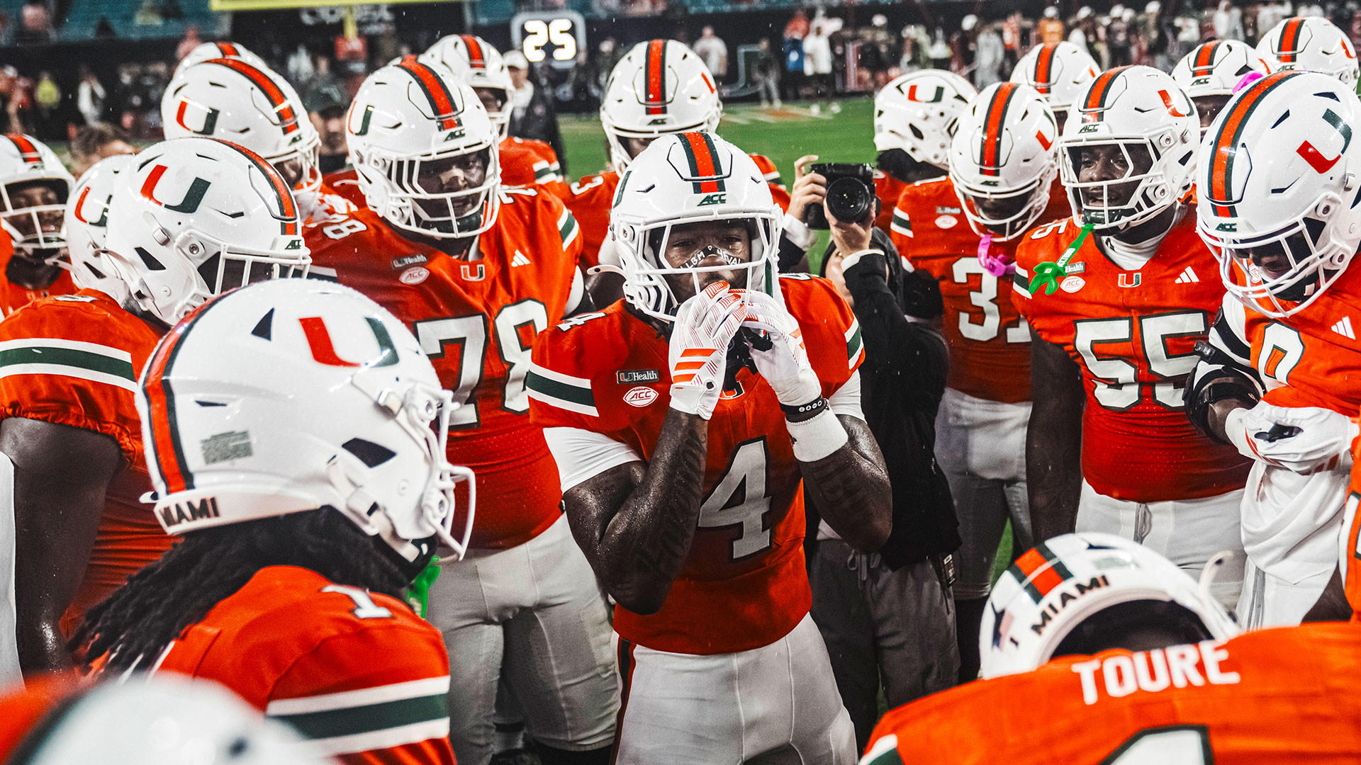 The Hurricanes huddle ahead of their game against rival FSU at Hard Rock Stadium.