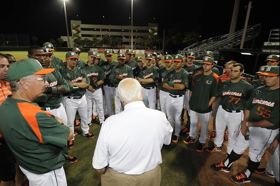 Tommy Lasorda speaks with members of the Miami Hurricanes baseball team before their Saturday night game against Milwaukee. The Hurricanes beat the...