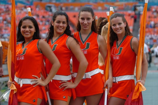 University of Miami Hurricane cheerleaders pose for a photo in a game against the University of Central Florida Knights at Dolphin Stadium on October...