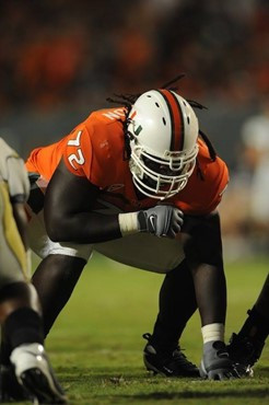 University of Miami Hurricanes offensive lineman Brandon Washington #72 gets set to block against the Georgia Tech Yellow Jackets at Land Shark...