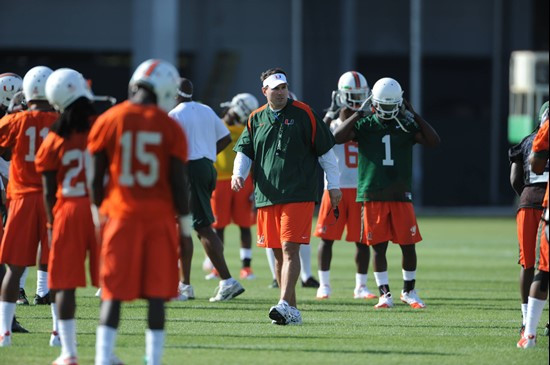 University of Miami Head Coach, Al Golden, instructs his team on how he wants them to execute his game plan during a spring practice at Greentree...