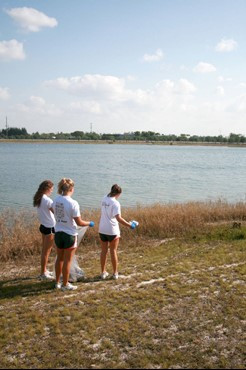 UM Staff, Coaches & Student Athletes volunteer at Amelia Earhart Park Community Service Project.