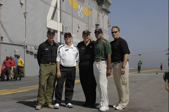 Coaches on the deck of the USS Nassau include (left): Auburn's Tommy Tuberville, Yales Jack Siedlecki, Notre Dame's Charlie Weis, Miami's Randy...