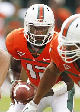 Miami quarterback Jacory Harris (12) turns to hand off the football against Duke. (AP Photo/Lynne Sladky)