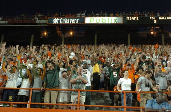 University of Miami students and fans cheer for the Hurricanes during a game against the Texas A&M Aggies at the Orange Bowl on September 20, 2007. ...
