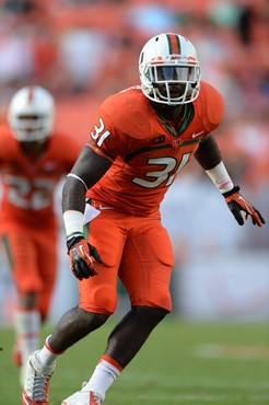 University of Miami Hurricanes linebacker Tyrone Cornileus #31 plays in a game against the Virginia Cavaliers at Sun Life Stadium on November 23,...
