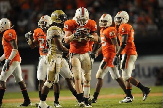 University of Miami Hurricanes linebacker Colin McCarthy #44 plays in a game against the Georgia Tech Yellow Jackets at Land Shark Stadium on...