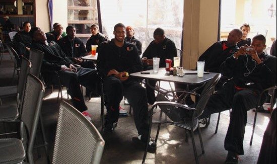 U Family: UM's men's basketball team cheered on the football team from Charleston.