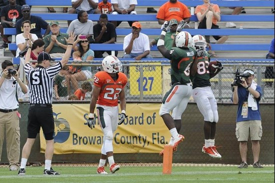 Lamar Miller celebrates a Kendall Tompkins TOUCHDOWN at the 2011 Miami Hurricanes Spring Football Game @ Lockhart Stadium