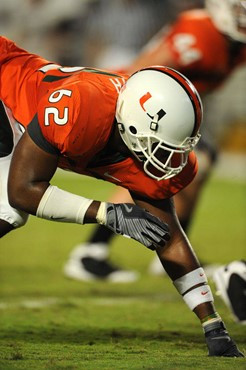 University of Miami Hurricanes defensive lineman Andrew Smith #62 gets set to rush in a game against Charleston Southern University in the Canes...