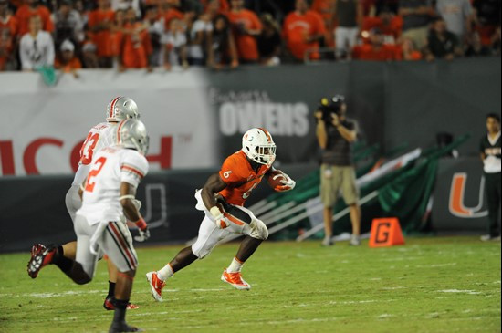 University of Miami Hurricanes running back Lamar Miller #6 ran for 188 yards in a game against the Ohio State Buckeyes at Sun Life Stadium on...