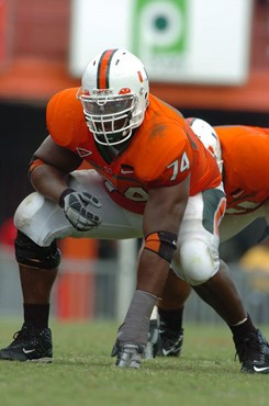 University of Miami offensive lineman Orlando Franklin #74 gets set to block in a game against the North Carolina State Wolfpack at the Orange Bowl on...
