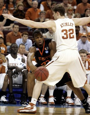 Raymond Hicks passes the ball around Texas forward Connor Atchley. (AP Photo/Danny Johnston)