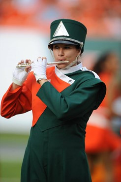 A University of Miami Band of the Hour participant entertains the crowd in a game against the University of Central Florida Knights at Dolphin Stadium...