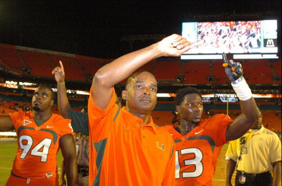 University of Miami Hurricanes head coach Randy Shannon and the team salute fans by singing the Alma Mater with them at the end of the game between...