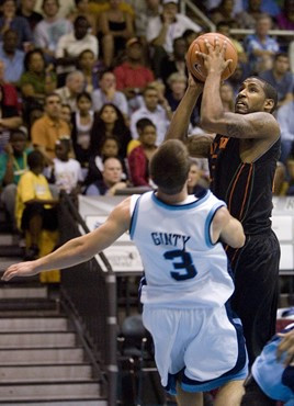 James Dews shoots against Devin Ginty.