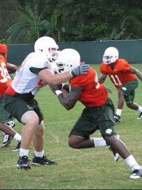 Jason Fox (L) and Eric Moncur (R) at practice Tuesday morning at the Greentree Practice Fields.