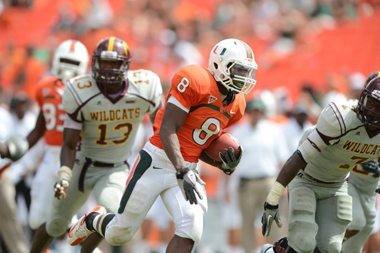 University of Miami Hurricanes running back Duke Johnson #8 plays in a game against the Bethune Cookman Wildcats at Sun Life Stadium on September 15,...