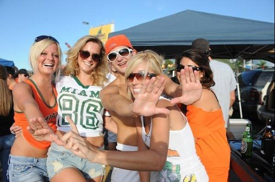 University of Miami Hurricane fans show their team spirit in a game against the Georgia Tech Yellow Jackets at Land Shark Stadium on September 17,...