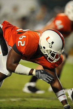 University of Miami Hurricanes defensive lineman Andrew Smith #62 gets set to rush in a game against Charleston Southern University in the Canes...