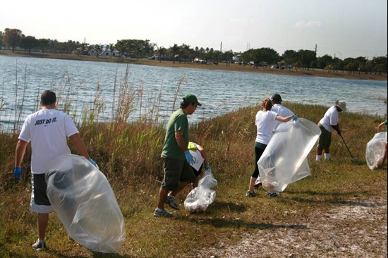 UM Staff, Coaches & Student Athletes volunteer at Amelia Earhart Park Community Service Project.