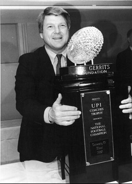 Head Coach Jimmy Johnson with the 1987 national championship trophy