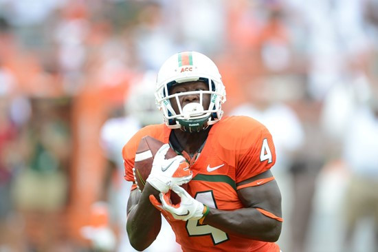 University of Miami Hurricanes wide receiver Phillip Dorsett #4 scores a touch down has he plays in a game against the #12 ranked University of...