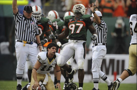 University of Miami Hurricanes defensive lineman Adewale Ojomo #97 celebrates after sacking Wake Forest quarterback Riley Skinner #11. Ojomo had 4...