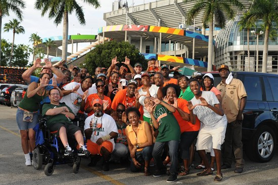 University of Miami Hurricane fans show their team spirit in a game against the Savannah State Tigers at Sun Life Stadium on September 21, 2013. ...