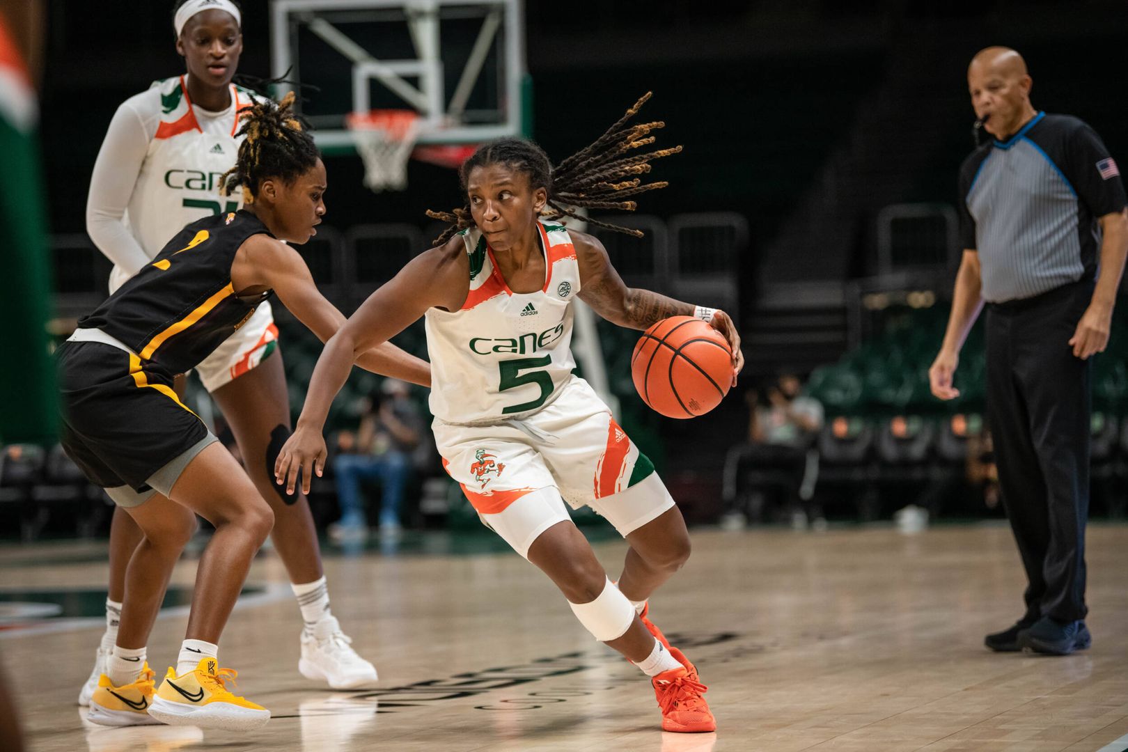 Canes Claw Past Wildcats