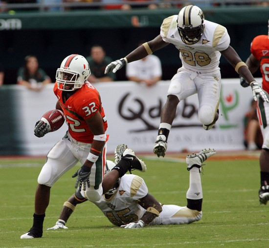 Lee Chambers runs for the first down as Adam Nissley and Jason Venson follow during second quarter.