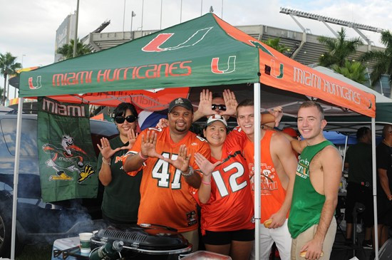 University of Miami Hurricane fans show their team spirit in a game against the Savannah State Tigers at Sun Life Stadium on September 21, 2013. ...