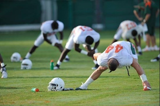 University of Miami Hurricanes players stretch at Greentree practice fields training for the upcoming 2010 season. The practice was open for Season...