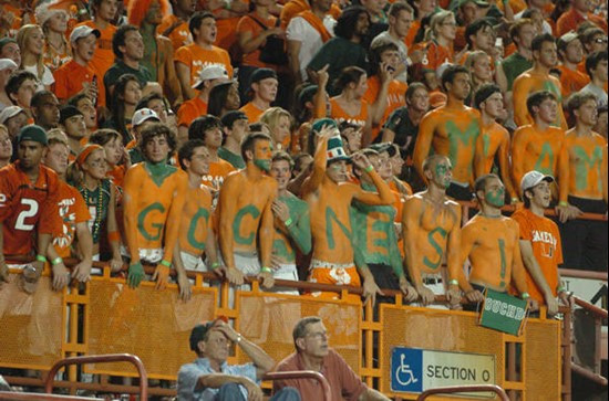 University of Miami students show their support for the Hurricanes during a game against the Texas A&M Aggies at the Orange Bowl on September 20,...