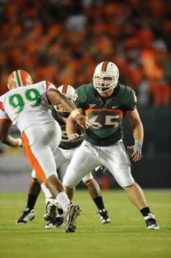 University of Miami Hurricanes offensive lineman Matt Pipho #65 gets set to block in a game against the Florida A&M Rattlers at Land Shark Stadium on...