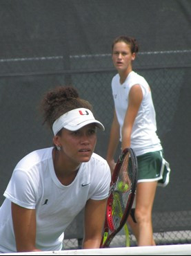 Bistra Otashlyska (R) serves alongside doubles partner Danille Mills (L) Saturday at the Neil Schiff Tennis Center.