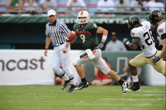University of Miami Hurricanes quarterback Robert Marve #9 looks downfield for an open receiver in a game against the Deamon Deacons of Wake Forest at...
