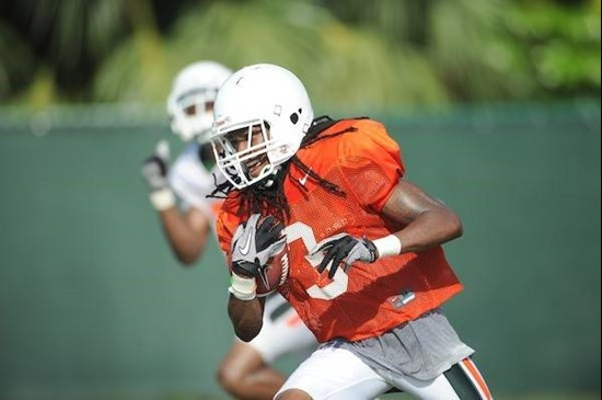 University of Miami Hurricanes wide receiver Travis Benjamin #3 catches a pass in drills at Greentree Practice Field on August 13 to prepare for the...