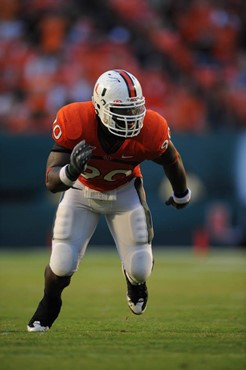 University of Miami Hurricanes defensive lineman Steven Wesley #90 rushes in a game against the University of Central Florida Knights at Dolphin...