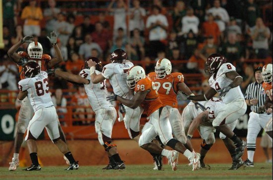 University of Miami defensive end Baraka Atkins #98 sacks Virginia Tech Hoakies quarterback Sean Glennon #7 during a game on November 4, 2006 at the...