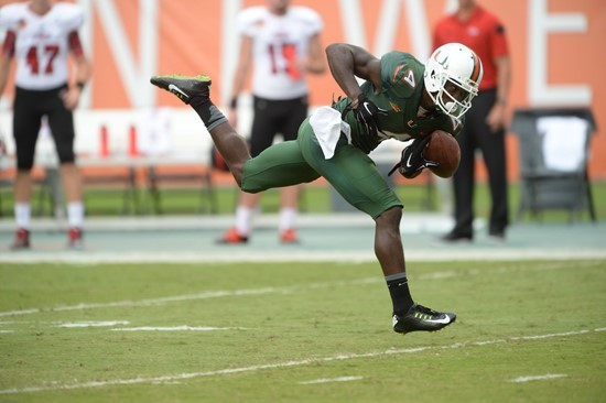 University of Miami Hurricanes wide receiver Phillip Dorsett #4 plays in a game against the Arkansas State Red Wolves at Sun Life Stadium on...