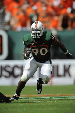 University of Miami Hurricanes defensive lineman Steven Wesley #90 plays in a game against the Deamon Deacons of Wake Forest at Dolphin Stadium on...