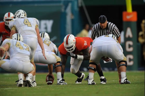 University of Miami Hurricanes defensive tackle Joe Joseph #91 gets set to rush in a game against the University of Central Florida Knights at Dolphin...