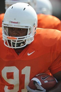 University of Miami Hurricanes running back David Thompson #91 rushes at Greentree Practice Field on August 13 in afternoon drills to prepare for the...