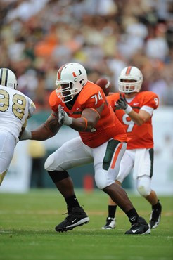 University of Miami Hurricanes offensive lineman Orlando Franklin #74 gets set to block against the University of Central Florida Knights at Dolphin...