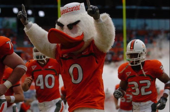 University of Miami mascot Sebastian the Ibis leads the team on the field in a game against the University of Central Florida Knights at Dolphin...
