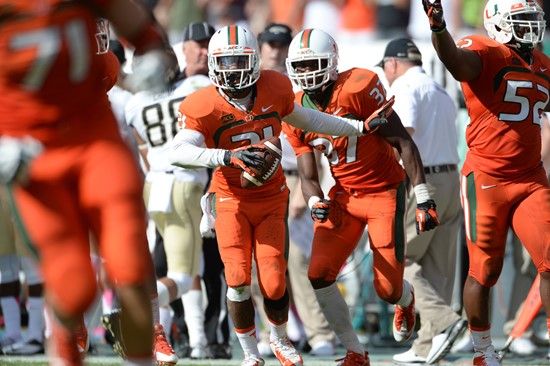 University of Miami Hurricanes defensive back Antonio Crawford #21 celebrates after intercepting a ball in a game against the Wake Forest Demon...